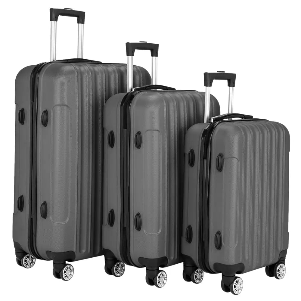 Set of three dark gray hard-shell spinner suitcases with black trim and silver wheels from the 3-in-1 hardshell luggage set.
