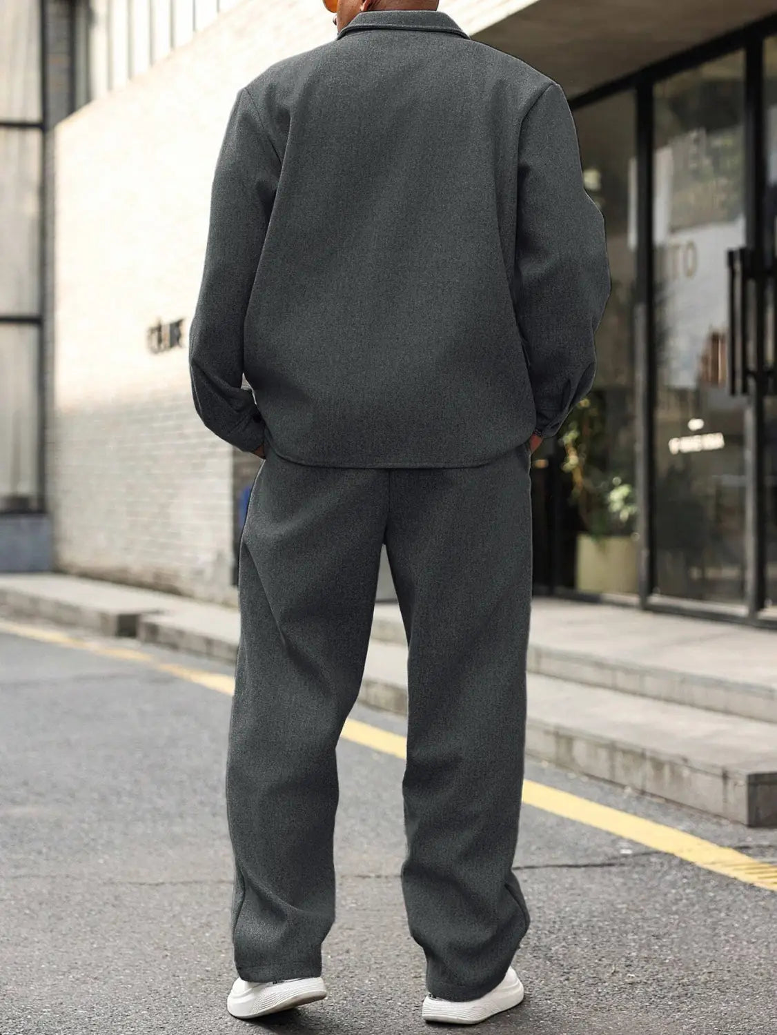 dark gray woolen mens cargo jacket with classic collar and relaxed fit paired with matching pants set