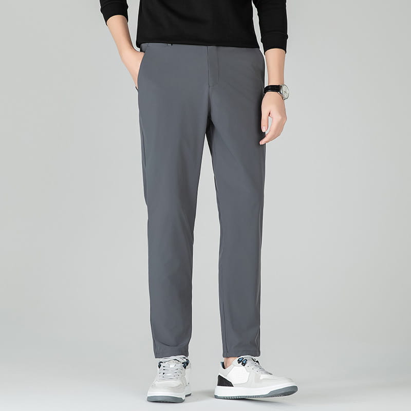 Men plus size stretch casual pants in gray slim-fit fabric with a smooth texture and subtle side seam detailing.