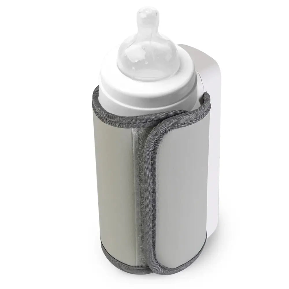 Gray fabric portable usb baby bottle warmer with six digital heat levels holding a white baby bottle inside