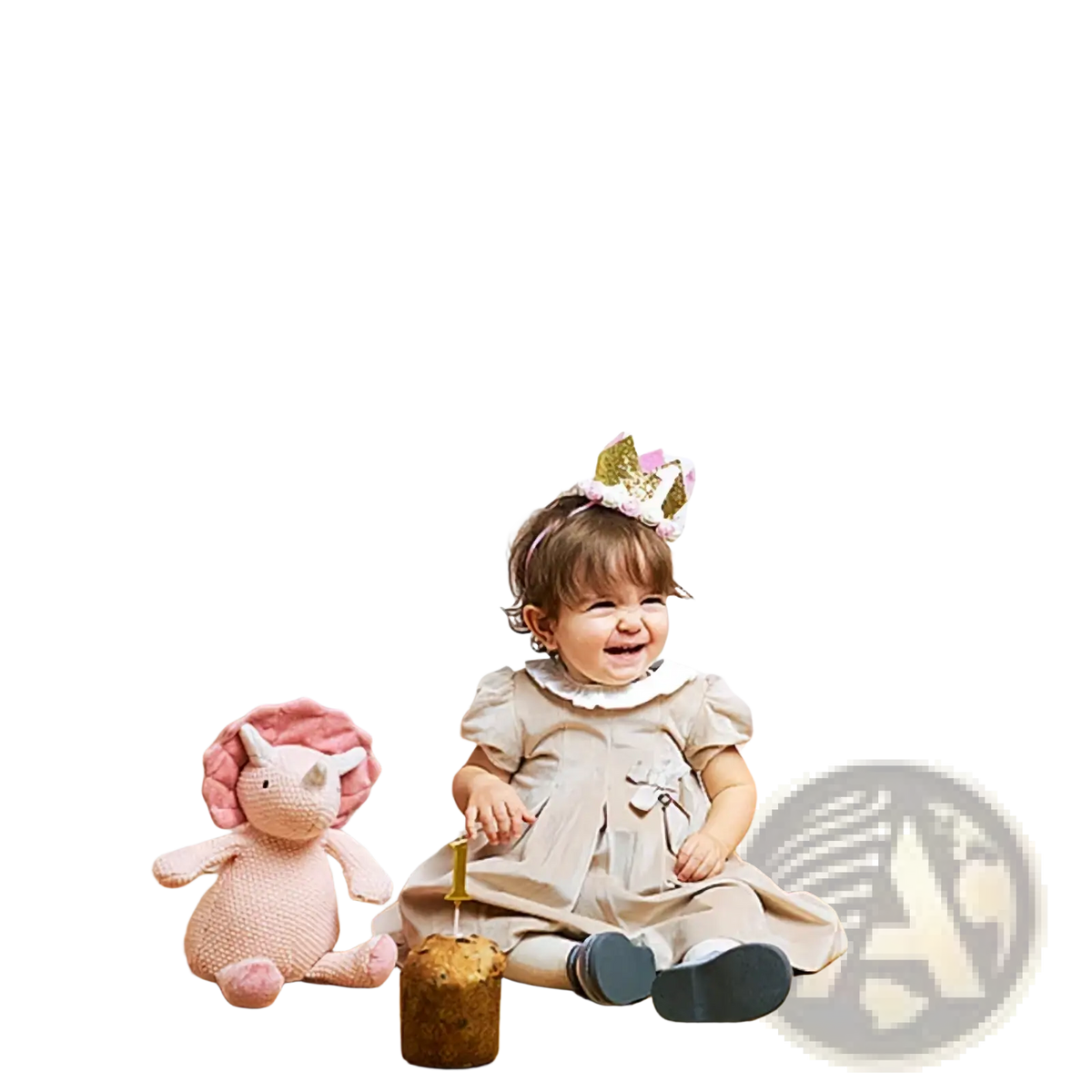 Smiling baby girl in beige lace dress and black shoes wearing gold glitter crown for 1st birthday photo banner garland