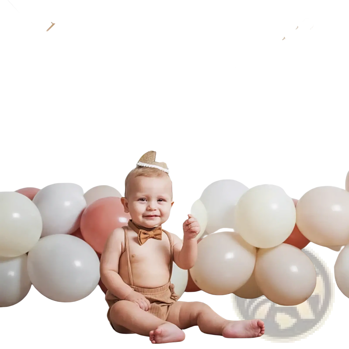 Gold foil happy birthday banner with numbered photo frames hanging above a baby for 1st birthday photo garland