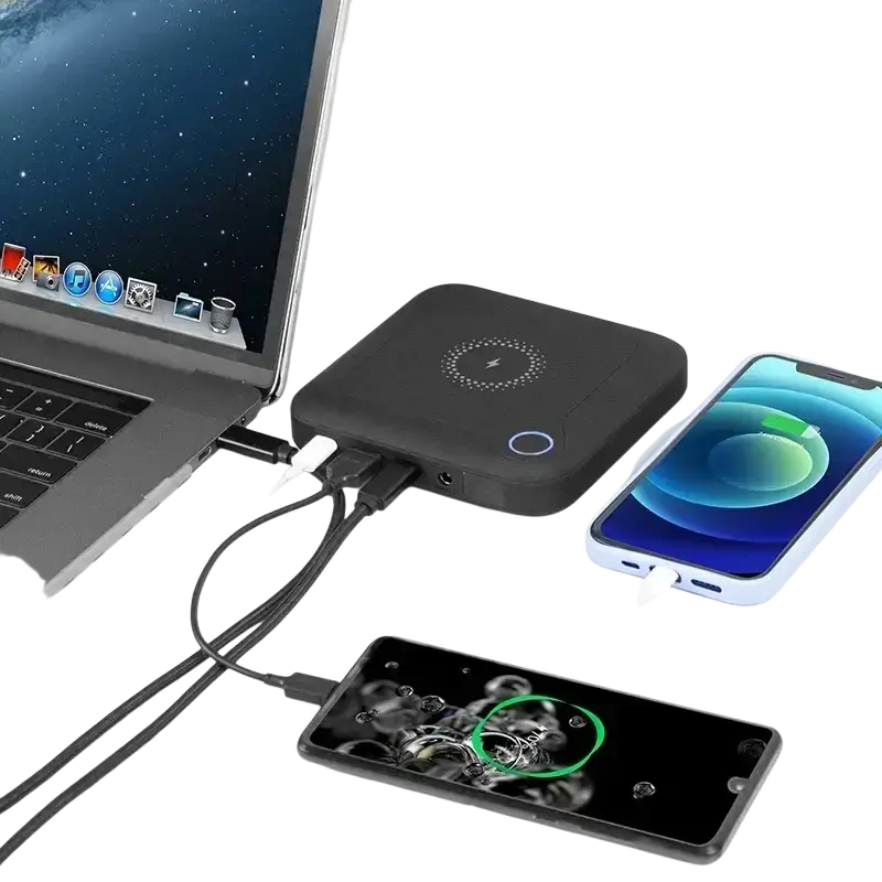 Black rectangular 20000mah laptop power bank with wireless charging and multiple ports connected to devices width 750px