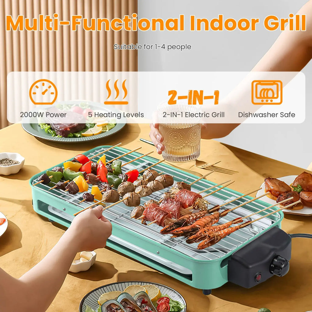 Teal electric indoor grill with black control panel metal grilling surface and three raclette trays for versatile cooking