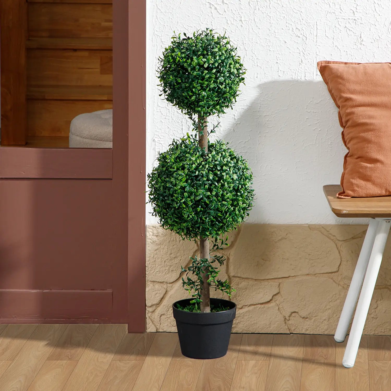 A set of 2 artificial boxwood topiary trees featuring tall two-tiered lush green foliage in sleek black pots measuring 36 inches.