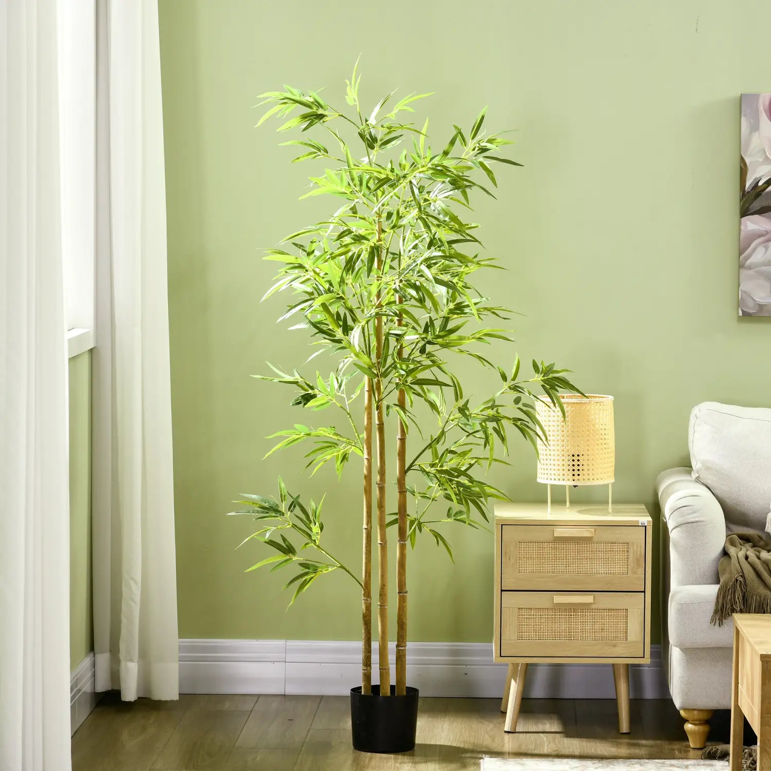 Planta decorativa falsa en maceta para interior: árbol artificial de bambú de 6 pies, con hojas verdes estrechas y tallos marrones de aspecto natural en una maceta negra elegante.