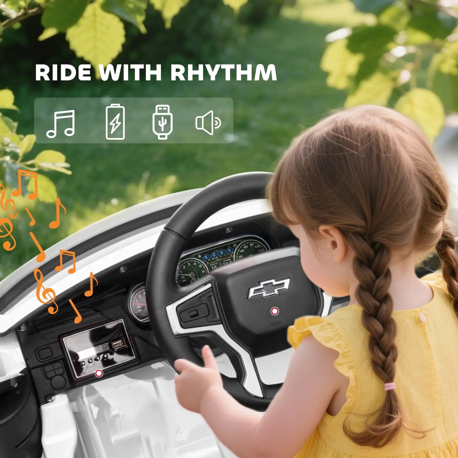 White and black 12v kids electric ride on Chevrolet toy suv featuring a Chevrolet logo on the steering wheel.