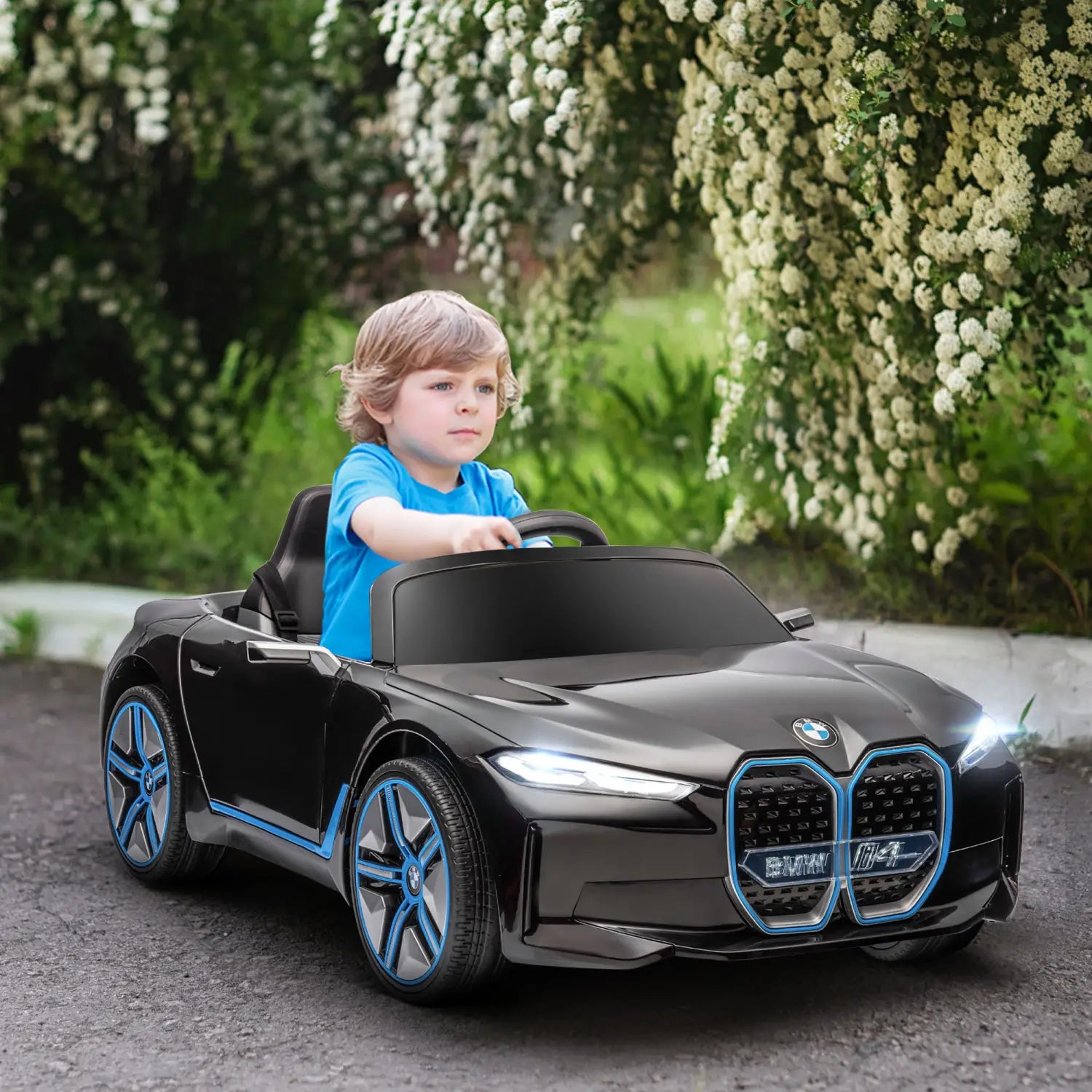 black childrens electric ride on car with blue accents featuring a bmw logo equipped with remote control and suspension system