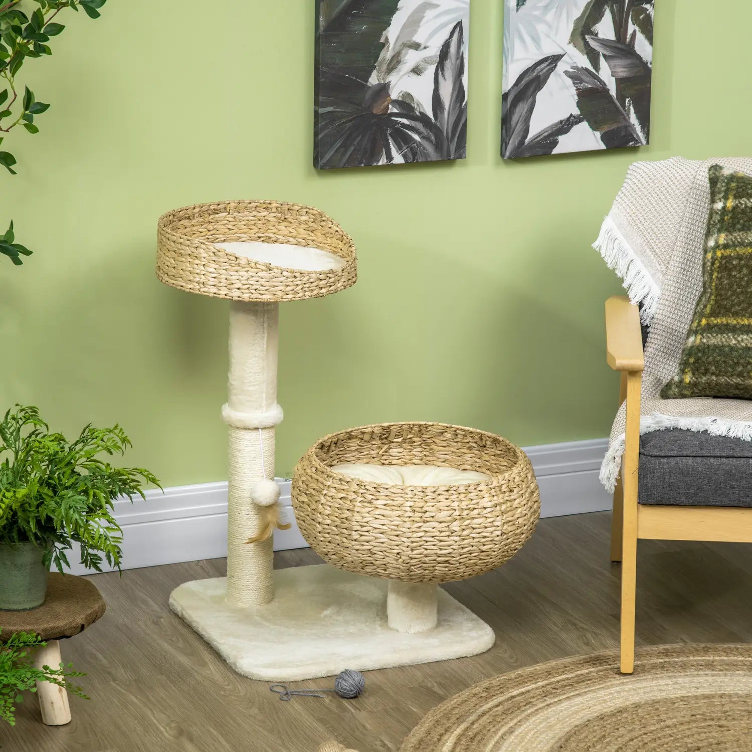 Natural woven wicker elevated cat bed and scratching post with a round top platform and matching bowl-shaped base featuring soft white cushioning.