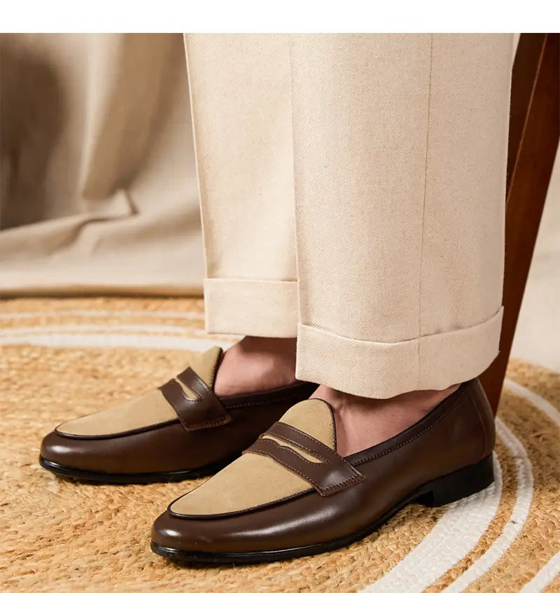 Two tone british style suede loafers with block heel featuring a classic brown and beige suede design.