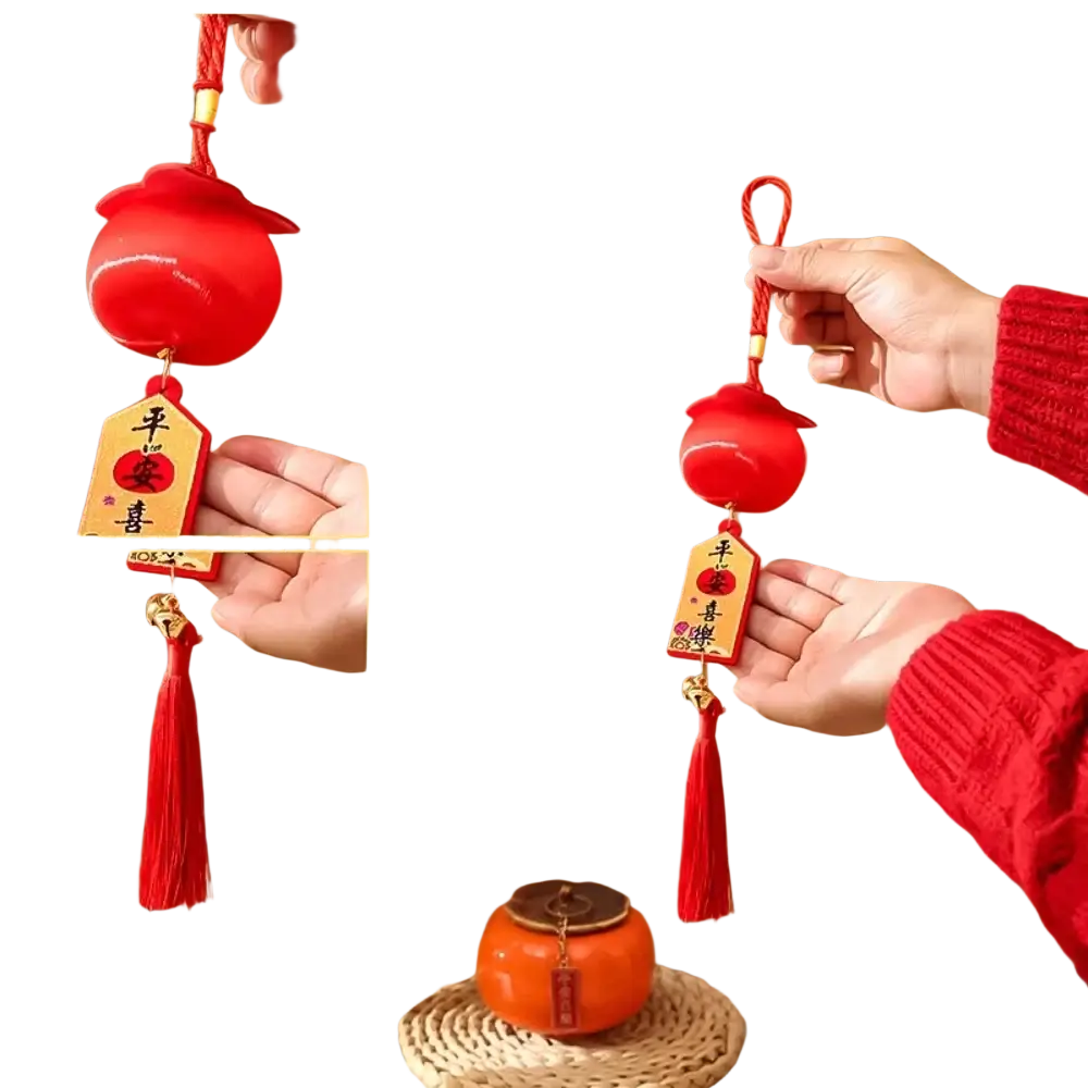 Red ceramic pomegranate-shaped 2025 Lunar New Year lantern pendant with a wooden tag and red tassel
