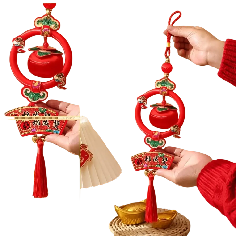 2025 Lunar New Year lantern pendant with tassels featuring a red circular frame and central fruit charm with gold detailing