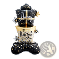 Black and gold foil balloon set shaped like stacked gift boxes with happy new year text stars and polka dots for 2026 celebration
