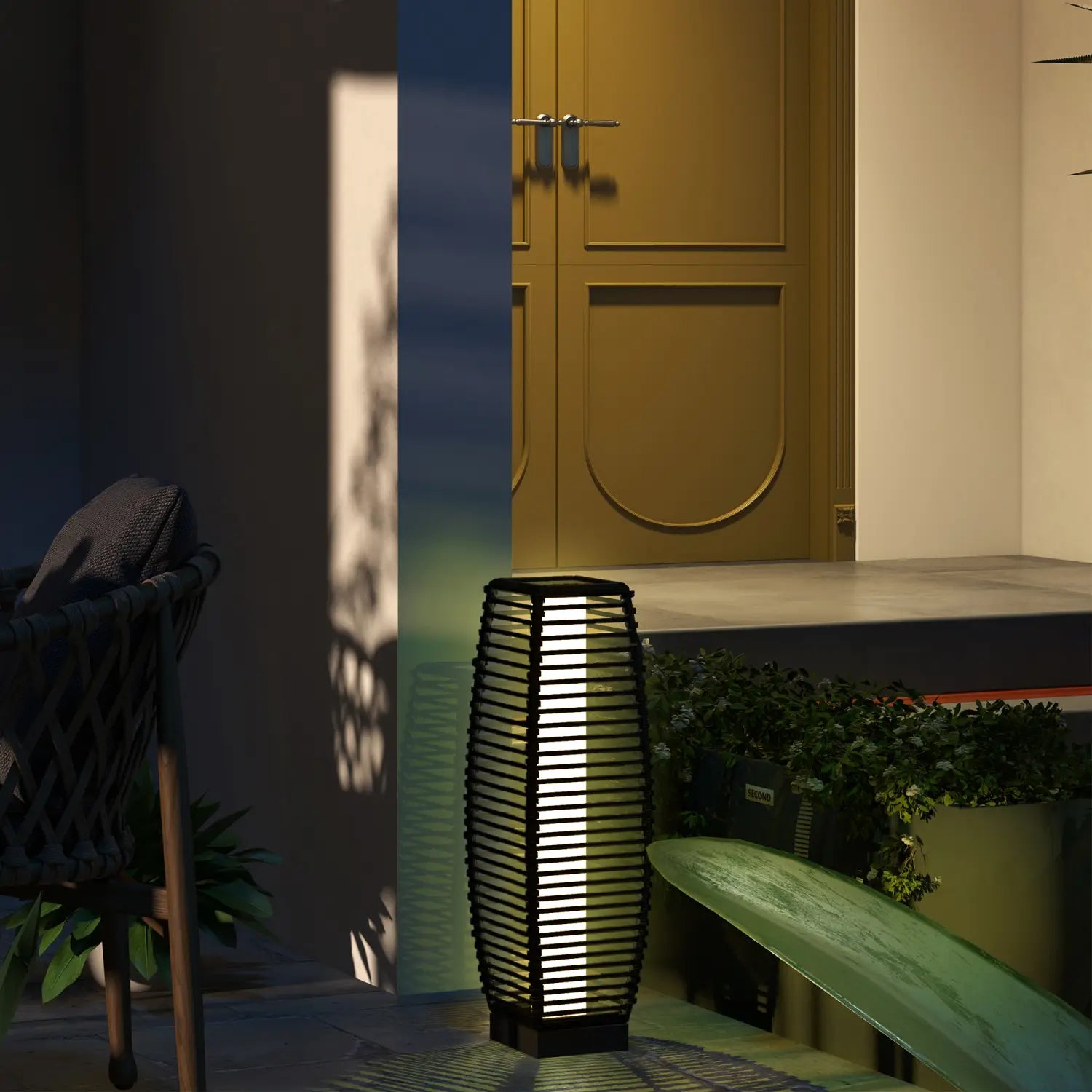 Black woven rattan solar floor lamp with vertical slats emitting a warm glow for outdoor garden path lighting.