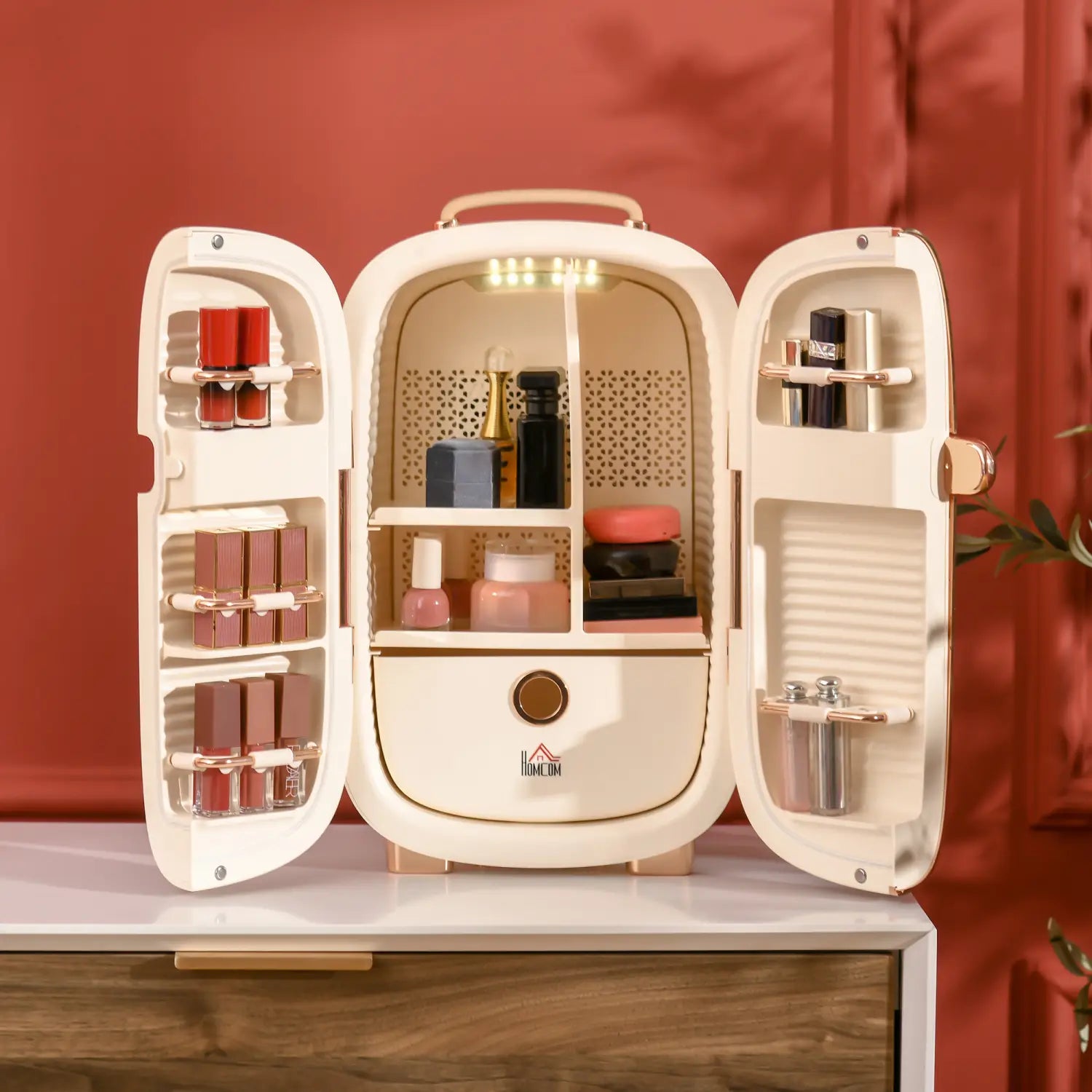 Cream-colored compact 12l portable beauty fridge with rose gold accents and led lighting inside displaying the led display panel.
