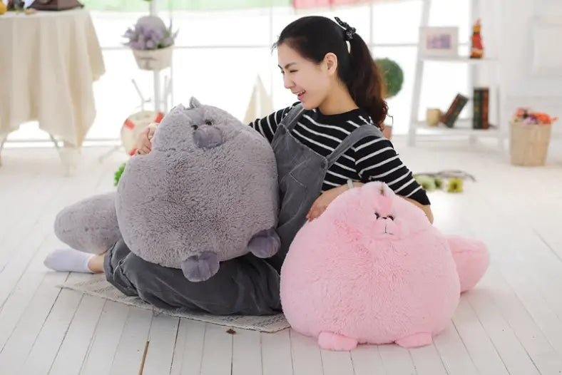 plush persian cat soft fluffy round pillow toy featuring gray and pink colors with a soft, fluffy texture and chubby, round design.