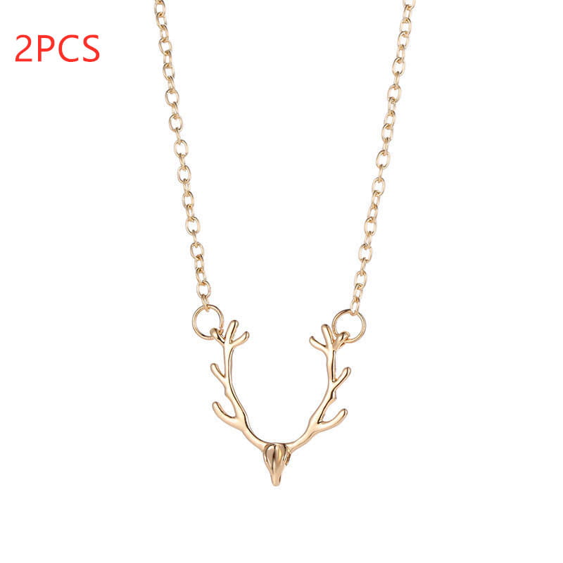 Gold-toned deer antler gemstone pendant clavicle necklace with a delicate chain.