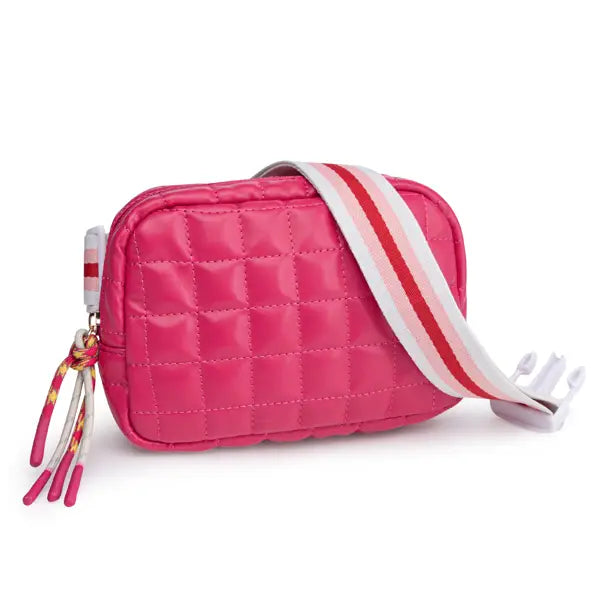 Vibrant pink quilted puffer belt bag made of soft material featuring a striped strap and colorful tassel accents.