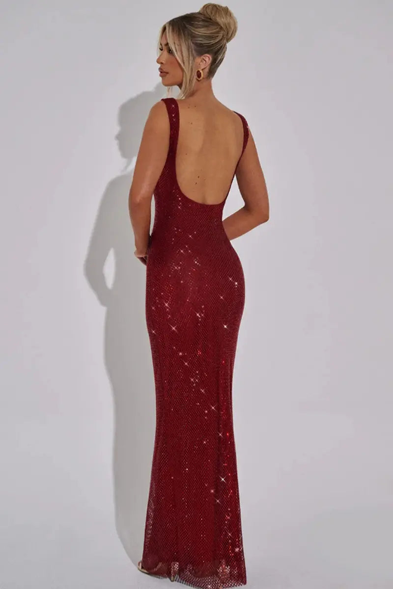 a shimmering burgundy sequined sequin square neck bodycon maxi sling dress with a fitted silhouette and an open back shown from the back side
