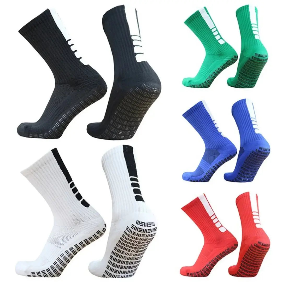 Grip soccer socks striped athletic non slip footwear in black, white, green, blue, and red with textured grip soles and striped side panels.