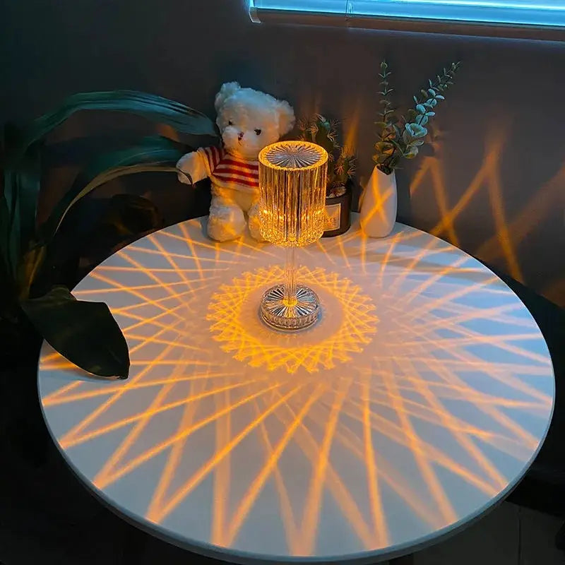 golden cylindrical crystal table lamp with faceted design and warm light projection featuring 3 way dimmable touch control for night use