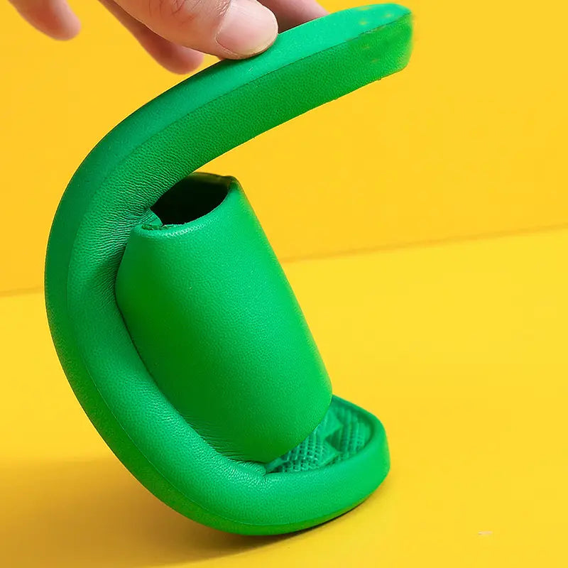 green rubberized massage slippers honeycomb textured rubber slides with curved flexible design and textured sole