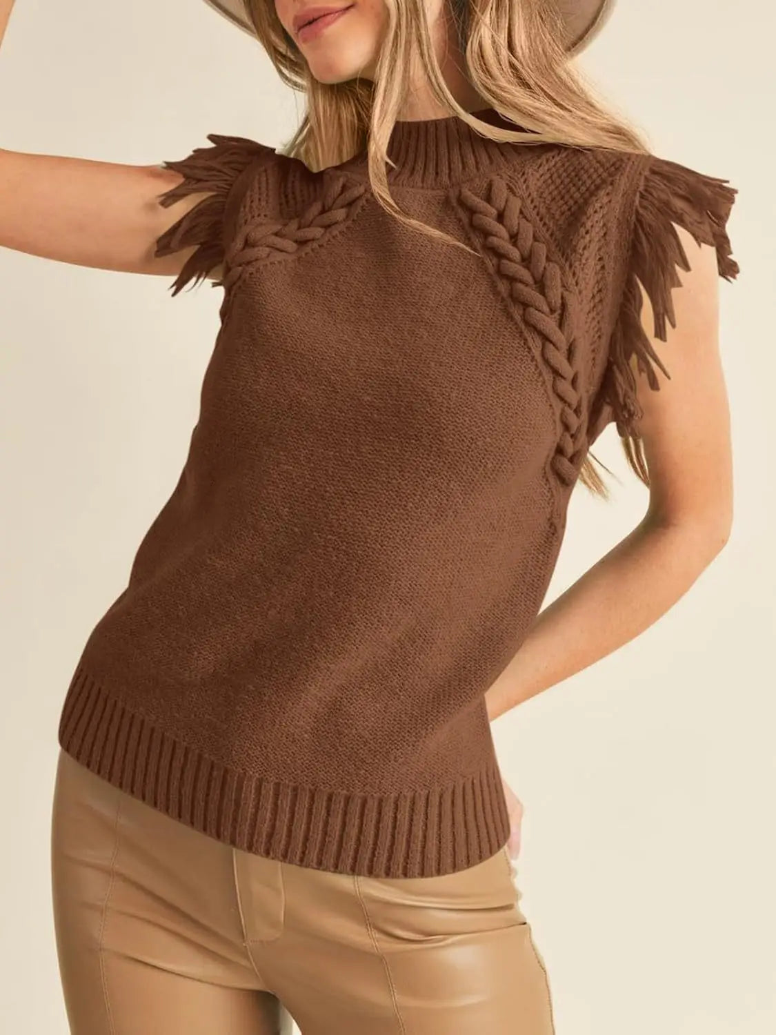 brown hand-woven sleeveless knit sweater vest featuring braided detailing and fringe trim