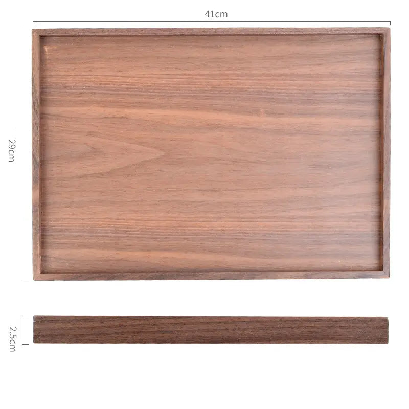 Acacia wood rectangular serving tray with a hand-polished smooth natural walnut grain finish and raised edges.