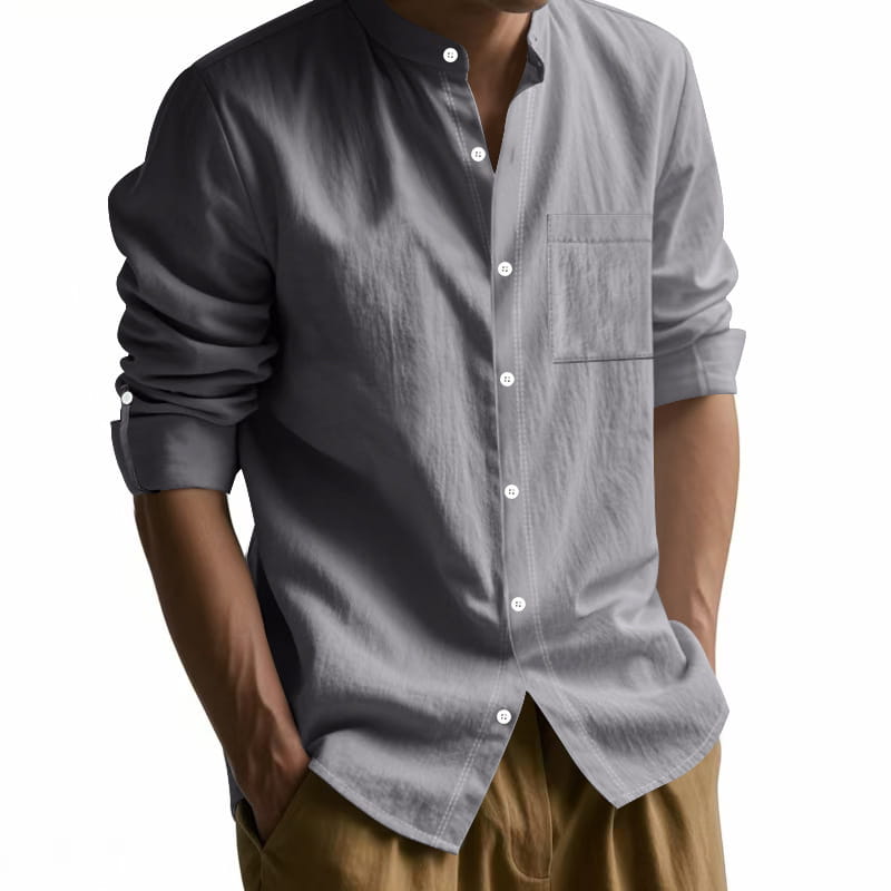 Men’s casual gray linen button-down shirt with white buttons and chest pocket for long sleeve wear.