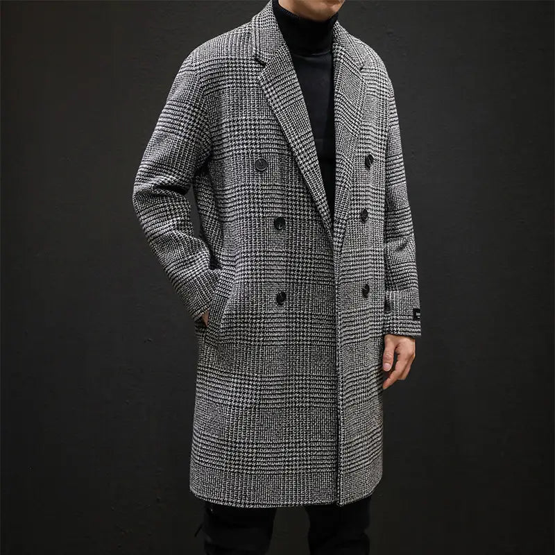 a classic black and gray houndstooth wool double breasted overcoat for men displayed from the front