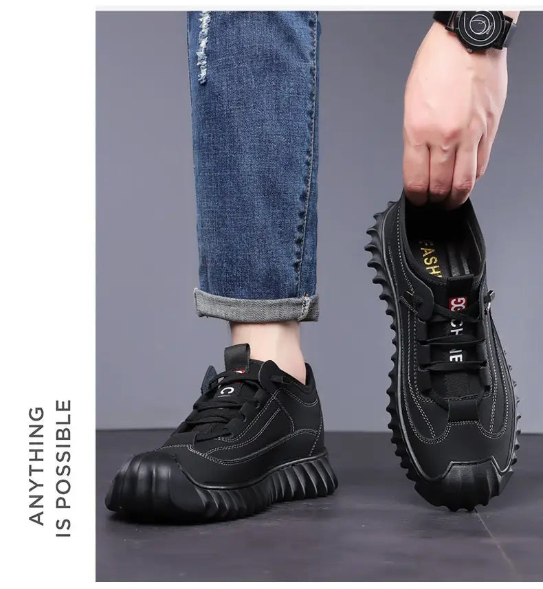 men’s suede casual sneaker in black with a chunky rubber sole featuring a rugged textured sole and reinforced toe cap