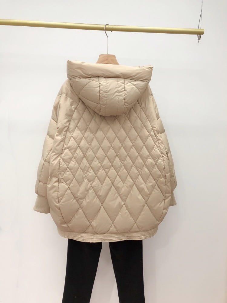 beige quilted white duck down puffer jacket with a hood and diamond stitching pattern for winter wear