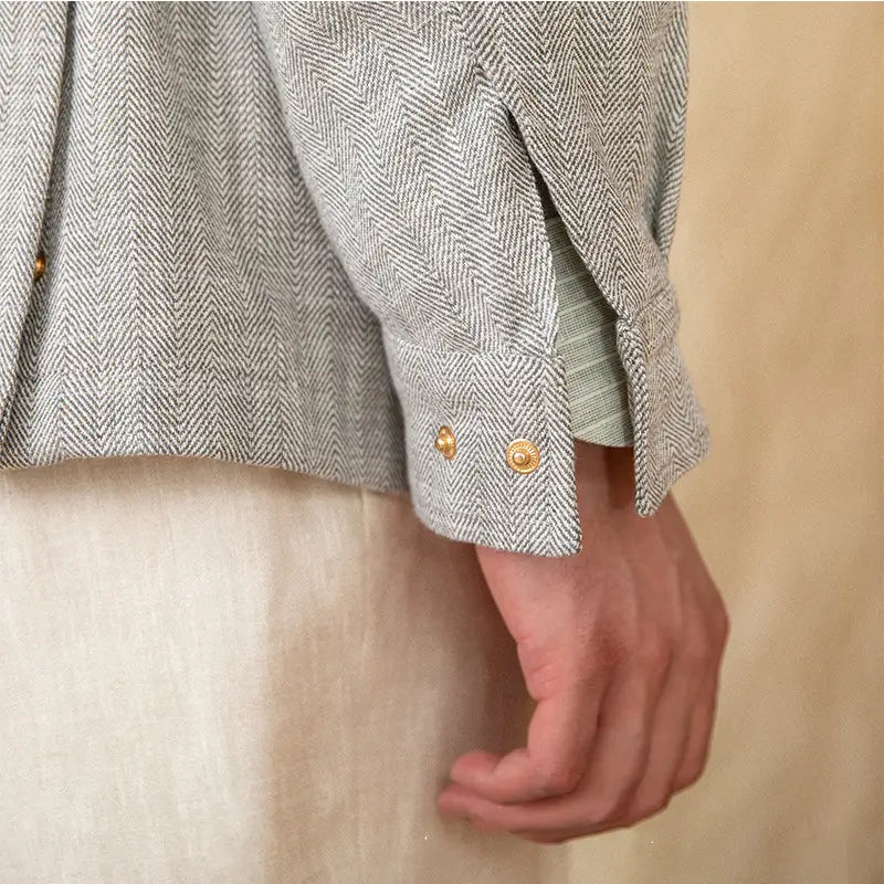 Cotton linen m65 safari jacket gray herringbone blazer sleeve with gold toned buttons detail