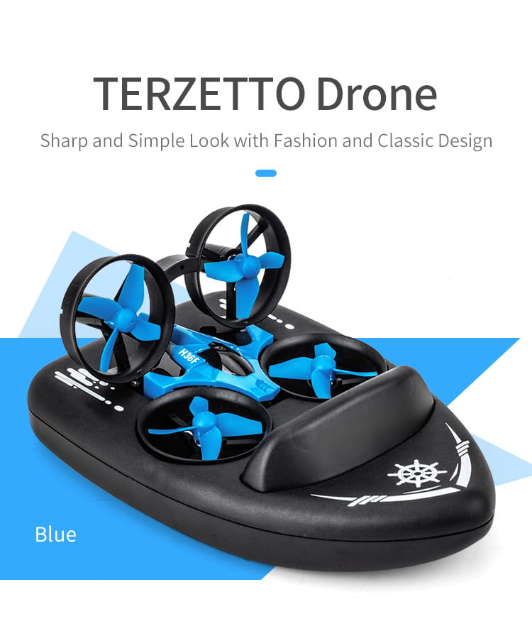 Dron planeador volador Terzetto 3 en 1 de color azul, con protectores de hélice negros, cuatro rotores y un diseño moderno y estilizado, sobre una base de carga a juego, diseñado para uso en tierra, agua y aire.