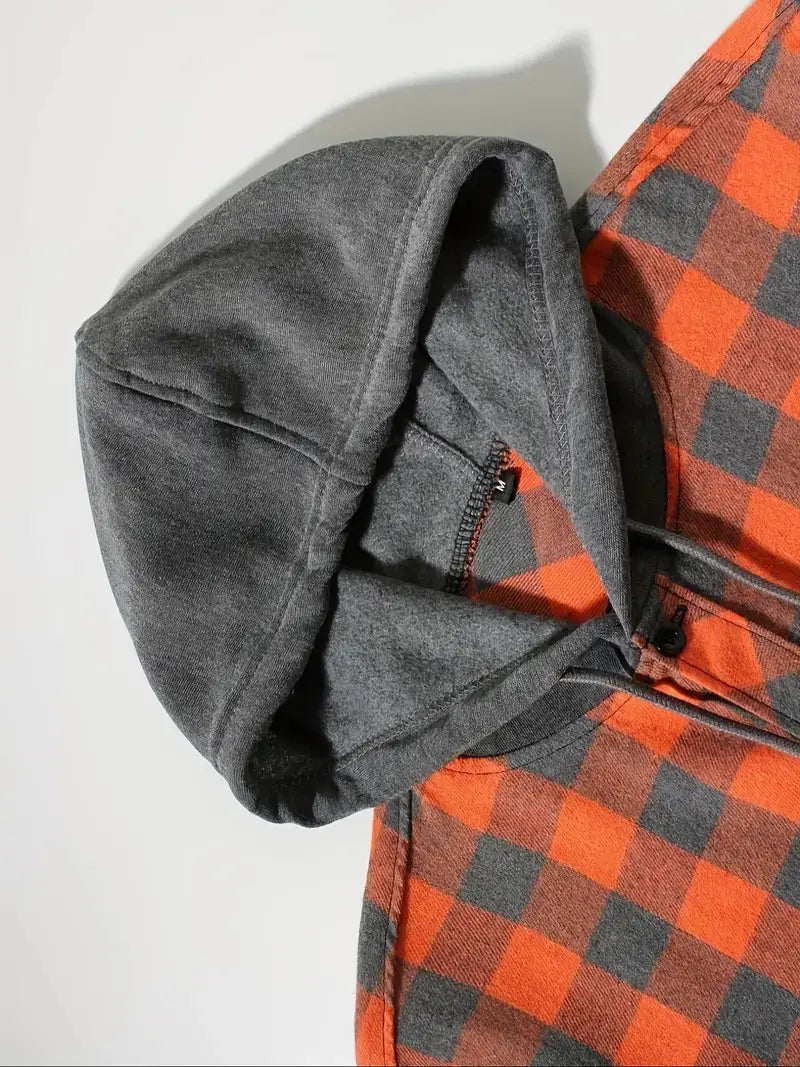 Men’s plaid hooded flannel shirt featuring an orange and dark gray plaid pattern with a cozy gray hood made of soft textured fabric and black zipper details.