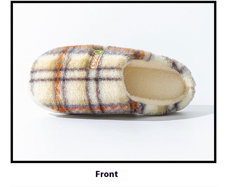 Unisex plaid fleece lined non slip indoor slipper with a soft fluffy exterior in cream orange and gray tones.