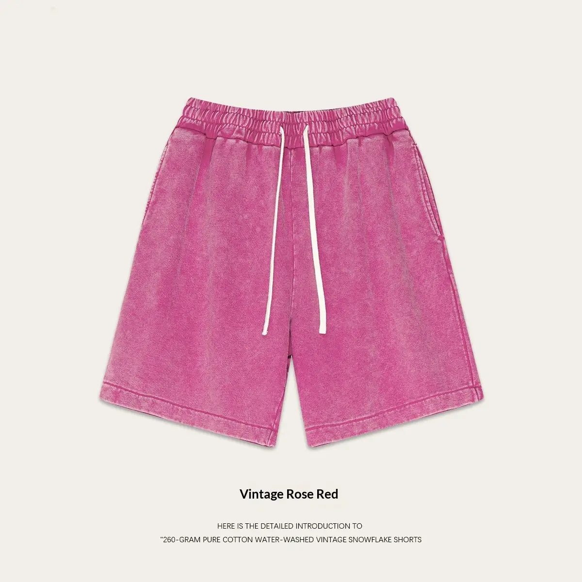 Vintage rose red distressed cotton shorts with a relaxed fit and white drawstrings designed for summer apparel.
