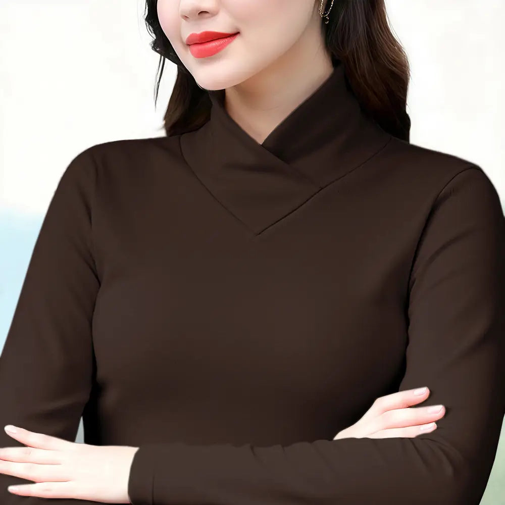 A sleek dark brown Dralon turtleneck thermal base layer top with long sleeves smooth fabric and high collar.