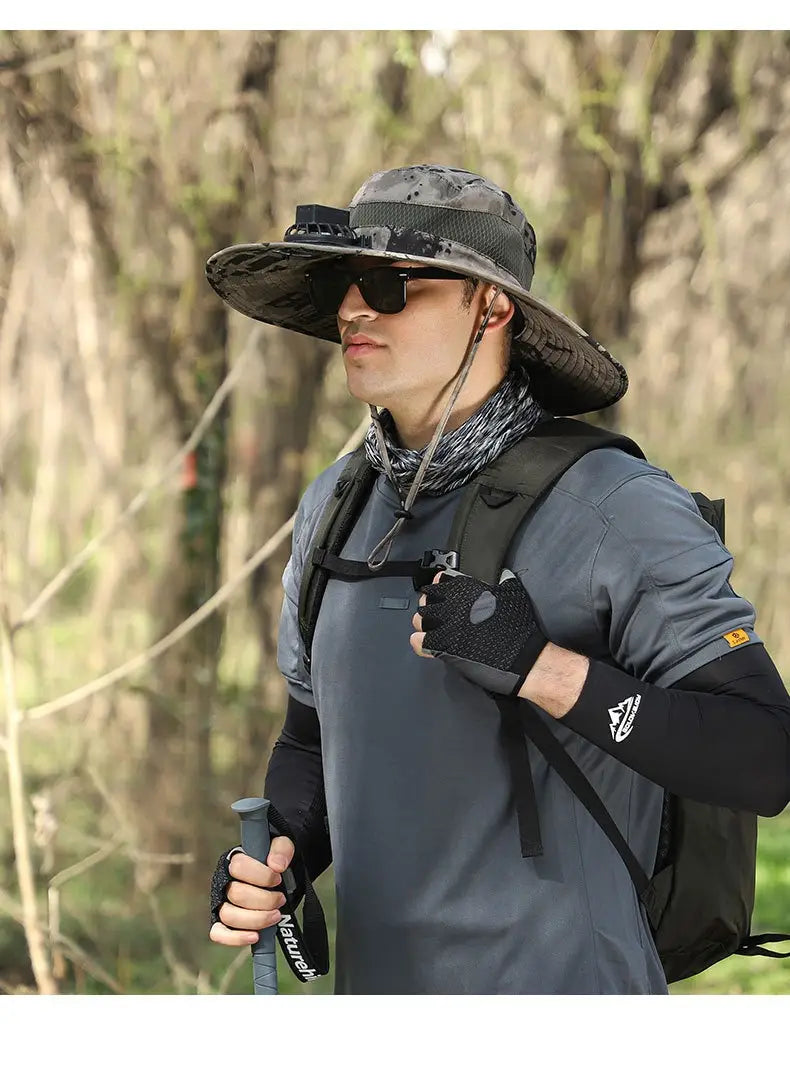 Gray camouflage bucket hat with wide brim and mesh panel designed for men sun hat camera mount and hiking use