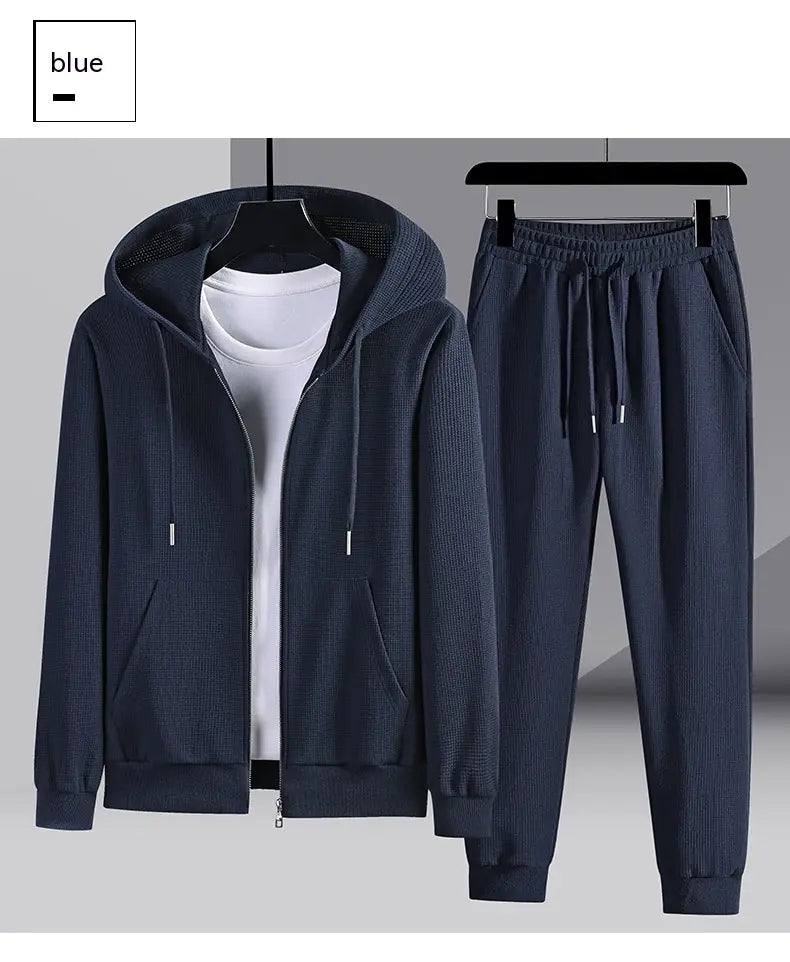 dark blue ribbed knit waffle hooded sportswear set featuring a zip-up hoodie and matching drawstring pants designed for comfortable athletic wear.