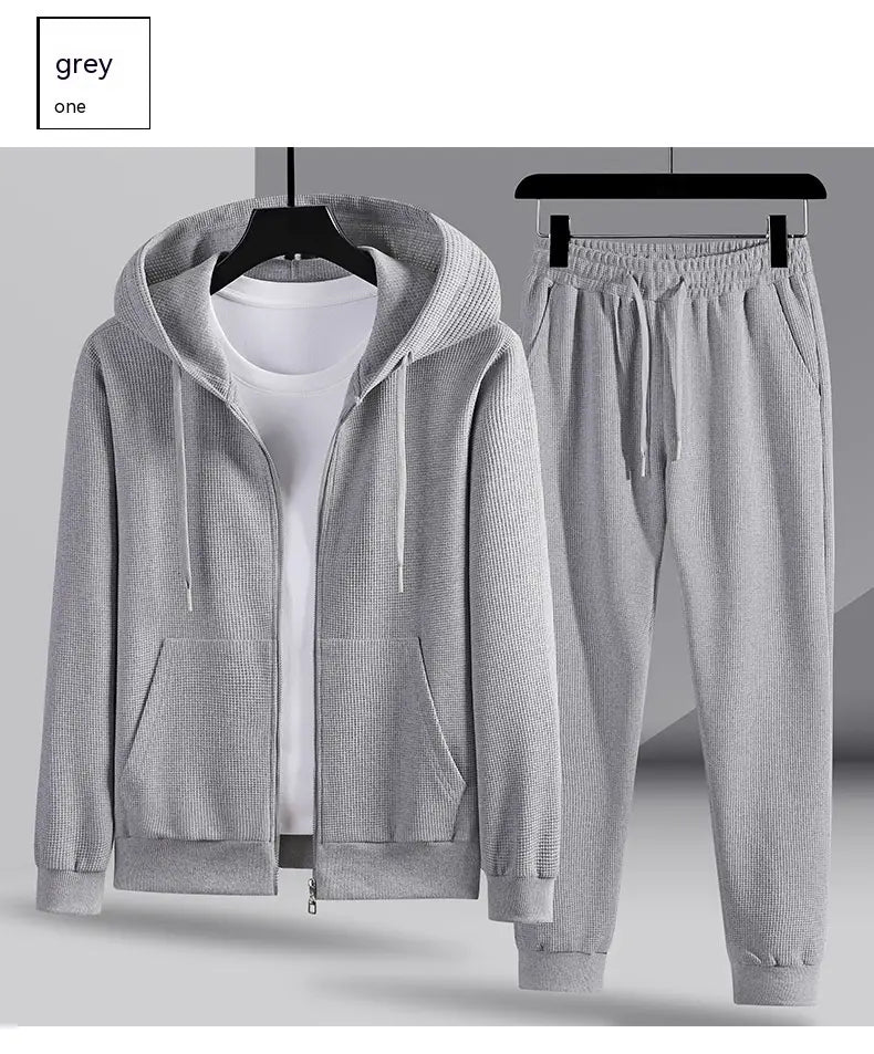 Grey ribbed knit waffle hooded zip-up jacket and matching jogger pants set designed for sportswear and casual use