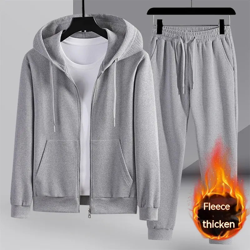 Gray waffle-knit fleece tracksuit with zip-up hoodie and matching joggers from the waffle hooded sportswear set designed for comfortable athleisure wear.
