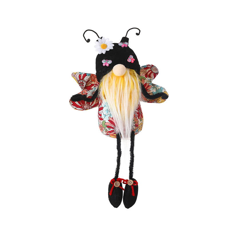 une décoration de peluche d’gnome abeille à longues jambes sans visage fantaisiste, avec un motif d’abeille noir et à motif floral, une longue barbe blonde, des ailes décoratives et des chaussures à boutons rouges