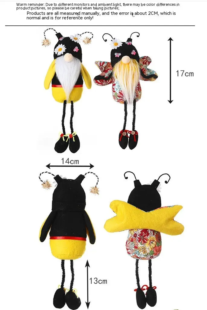 deux poupées peluche d’gnome abeille à longues jambes sans visage : l’une en jaune et noir avec une barbe blanche et des ailes à motif floral, et l’autre en tissu à motifs avec des antennes assorties, pour une utilisation décorative