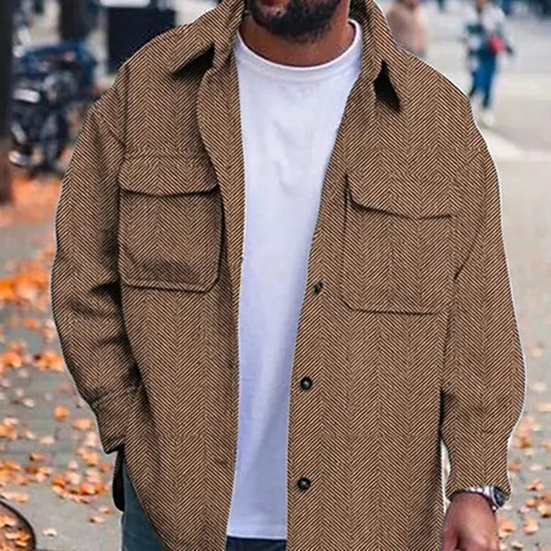 Men’s casual work shirt herringbone overshirt made of brown wool with a herringbone pattern, two chest pockets, and black buttons.