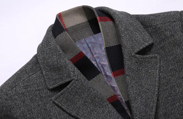 Men wool overcoat in gray with a plaid-lined collar featuring black red and beige stripes designed as a lapel winter jacket.