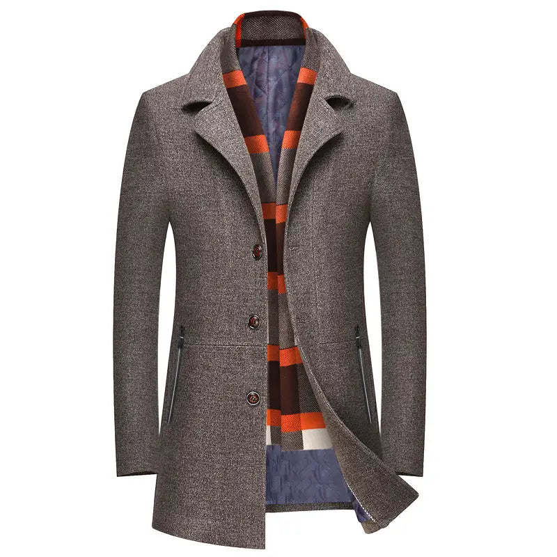 Men wool overcoat in gray wool with a notched collar and three dark brown buttons featuring a contrasting orange black and white striped scarf inside plaid lined for winter use.