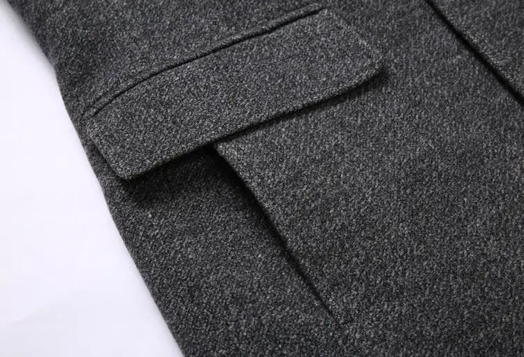 Dark gray woolen men wool overcoat with textured heathered fabric and flap pocket suitable for winter use.