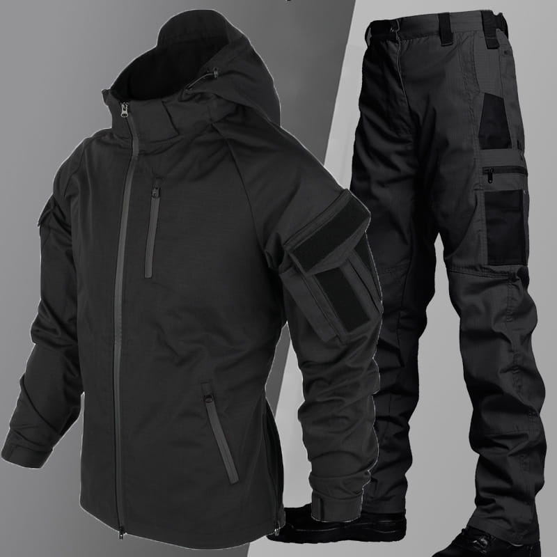 Black tactical soft shell jacket with hood and multiple zippered pockets paired with matching black cargo pants suitable for outdoor and tactical use.