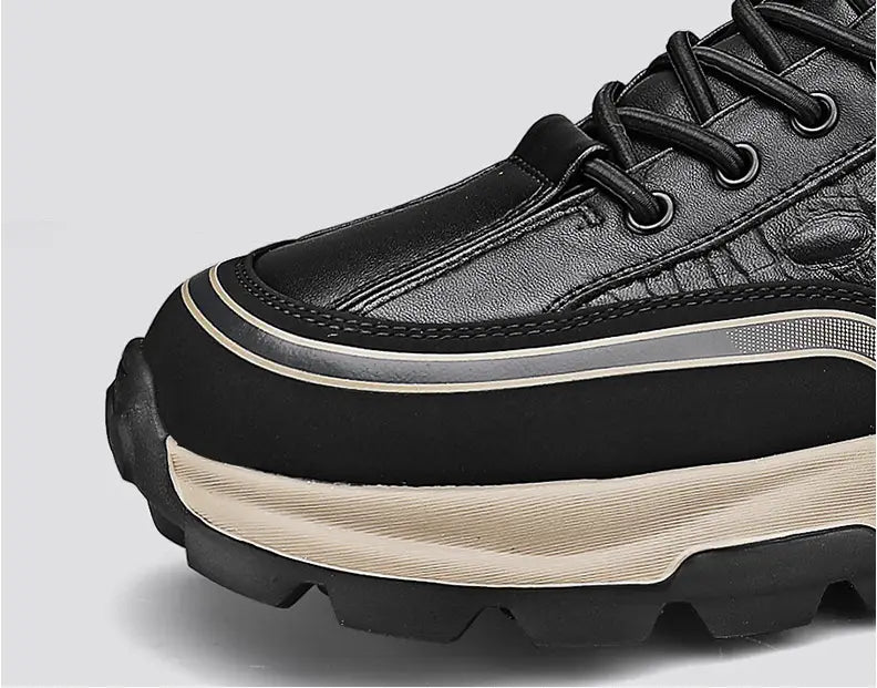 men’s black crocodile embossed leather sneakers with a thick layered sole featuring beige and black tones